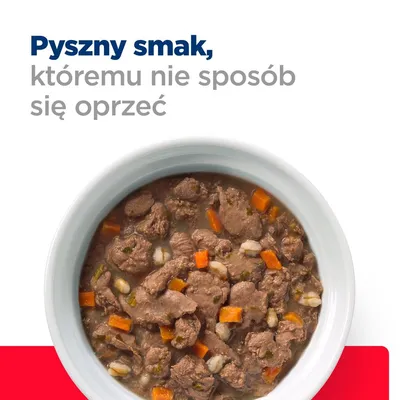 Miska z mokrą karmą dla zwierząt, widoczne kawałki mięsa, marchewki i ziaren. Tekst: Pyszny smak, któremu nie sposób się oprzeć.