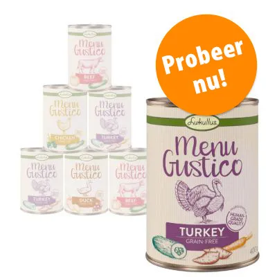 Lukullus Menu Gustico blikvoeding, varianten Beef, Chicken, Turkey, Duck zichtbaar. Groot blik met tekst: Menu Gustico Turkey Grain-Free, Human-Grade Quality. Oranje cirkel: Probeer nu!