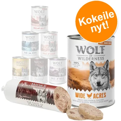 Wolf of Wilderness -koiranruokaa: säilykepurkki 'Wide Acres', teksti '100% grain-free recipe', maku kana, sekä makkarapakkaus 'The Taste of Canada'. Oranssi ympyrä: Kokeile nyt!