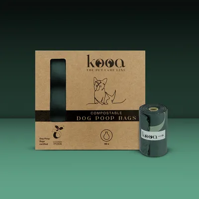 kooa The Pet Care Line. Komposterbara hundbajspåsar, certifierade, 90 stycken. Förpackning med hundgrafik och synlig rulle med påsar.