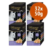 4 confezioni Miamor Feine Filets Mini per gatto, visibile scritta 32x50g. Ogni scatola contiene 8 buste da 50g con vari gusti indicati: pollo, tonno, verdure, calamari, surimi.