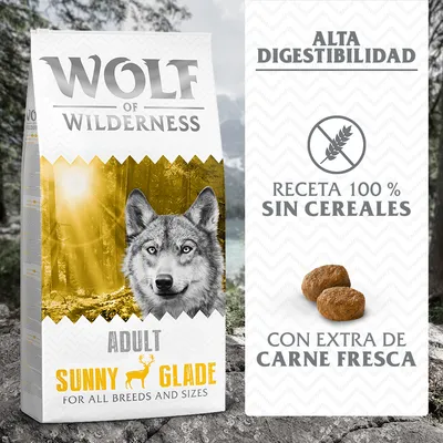Pienso Wolf of Wilderness Adult Sunny Glade. Alta digestibilidad, receta 100 % sin cereales, con extra de carne fresca. Para todas las razas y tamaños. Imagen de croquetas visibles.