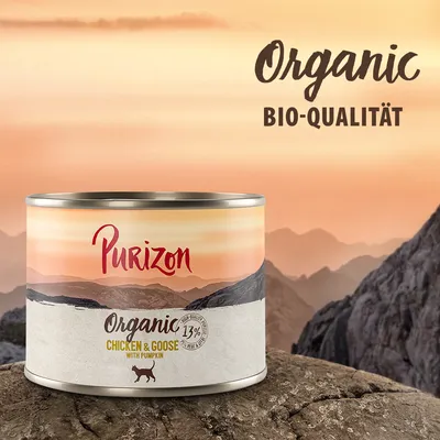 Purizon Organic Chicken & Goose mit Kürbis, Bio-Qualität, 13% Protein. Dose vor Berglandschaft.