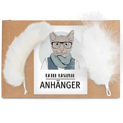 Kater Kasimir μπρελόκ με δύο λευκά φτερά σε καφέ συσκευασία.