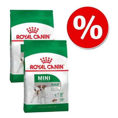 2 συσκευασίες Royal Canin Mini Adult με εικόνα σκύλου και πράσινη ετικέτα. Κόκκινος κύκλος με σύμβολο ποσοστού (%) για προσφορά.