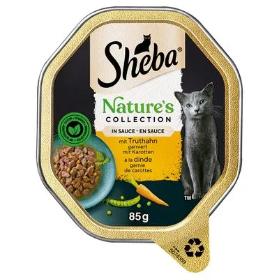 Sheba Nature's Collection in saus, met kalkoen en wortel, 85g. Afbeelding van kattenvoer, wortel, erwt en een grijze kat op de verpakking. Tekst deels in Duits en Frans.