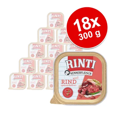 Pachet 18 x 300 g Rinti Kennerfleisch mit Rind, getreidefrei. Imagine cu mai multe tăvițe de hrană umedă pentru animale, text vizibil pe ambalaj și etichetă roșie cu cantitatea.