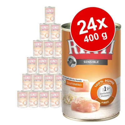 Pack de 24 latas de 400 g de Rinti Sensible, visible texto: 100% Huhn, glutenfrei, 1% tierisches Protein, +Reis. Imagen de pollo y arroz en la etiqueta.