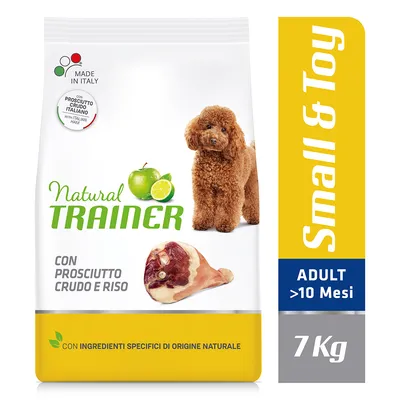 Natural Trainer hundefoder, Small & Toy, ADULT >10 Mesi, 7 kg. Con prosciutto crudo e riso. Made in Italy. Med billede af lille brun hund, æble, lime og skinke.