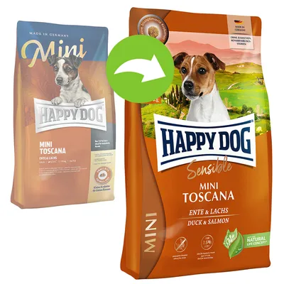 Переход с прежней упаковки на новую: корм для собак Happy Dog Sensible Mini Toscana Ente & Lachs (утка и лосось), видны обе версии упаковки, надписи на английском и немецком.