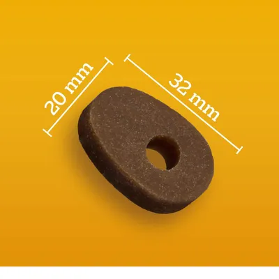 Vue d'une croquette ovale avec trou central, dimensions indiquées : 20 mm de largeur et 32 mm de longueur.
