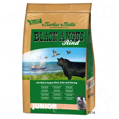 Markus Mühle Black Angus Rind Junior, koldpresset, med Black Angus oksekød, and og sild. Pakken viser 15 kg indhold og naturmotiv med hund og ko.
