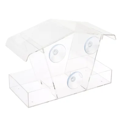 Transparentes Vogelhaus aus Acryl mit vier Saugnäpfen zur Befestigung an Fenstern.