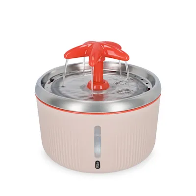 Fontana per acqua con inserto a forma di fiore rosso, bordo in acciaio inox e indicatore del livello dell'acqua sul davanti.