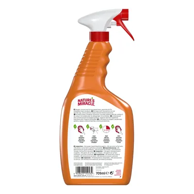 Baksida av sprayflaska Nature's Miracle, instruktioner och symboler för användning på engelska, franska och spanska. Volym: 709 ml. Streckkod synlig längst ner.