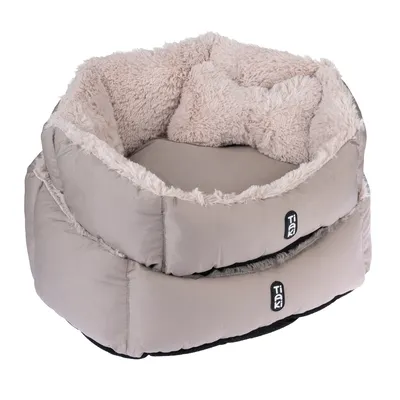 Deux paniers pour animaux Tiaki, tissu beige avec intérieur en fausse fourrure crème, étiquette de marque visible sur chaque panier.