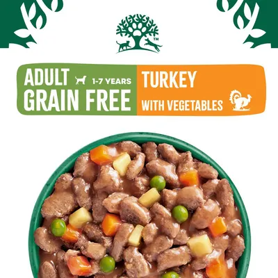 Adult grain free food for ages 1-7 years, turkey with vegetables. Image shows chunks in gravy with peas, carrots and potatoes.