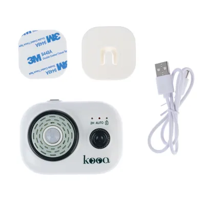 kooa-laite USB-kaapelilla, seinäkiinnikkeellä ja kaksipuolisella teipillä. Näkyvät toiminnot: 2H, automaattitila ja lukituskuvake.