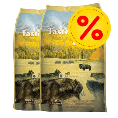 To sække Taste of the Wild High Prairie Canine Formula with Roasted Bison & Roasted Venison. Stor gul procenttegn viser tilbud.