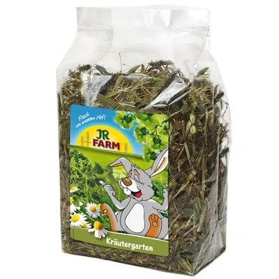 Opakowanie ziołowej mieszanki JR Farm Kräutergarten, widoczny rysunek królika i napis 'Frisch vom unseren Hof!'. Zawartość: suszone zioła.