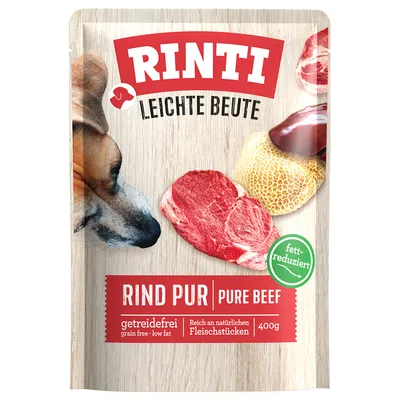 RINTI Leichte Beute Rind Pur, без зерна, с пониженным содержанием жира, богат натуральными кусочками мяса, 400 г. На упаковке изображено сырое говядина и морда собаки.