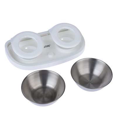 Set di ciotole Modern Living con supporto in plastica bianca e due ciotole in acciaio inox rimovibili.