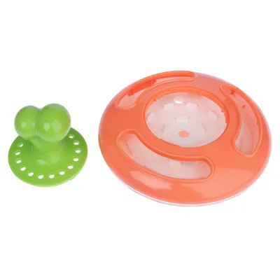 Toy made of plastic, consisting of a green suction cup holder and an orange-white round element with openings.
