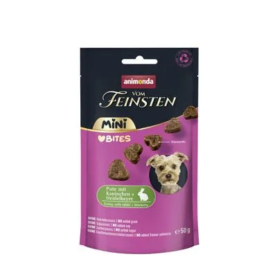animonda Vom Feinsten Mini Bites, Pute mit Kaninchen + Heidelbeere, 50 g. Afbeelding van kleine hond en zichtbare snacks op de verpakking.