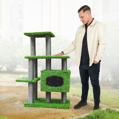 Kratzbaum mit grünem Kunstrasen, drei Ebenen und einer Höhle. Geeignet für Katzen zum Spielen und Klettern.