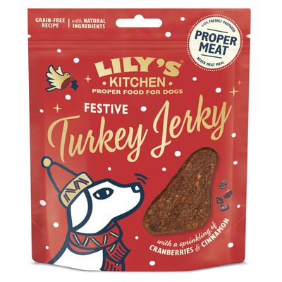 Lily's Kitchen Simply Glorious Chicken Jerky, 70g. Verpackung mit zwei Hähnchen-Jerky-Stücken und illustriertem Hundedesign.