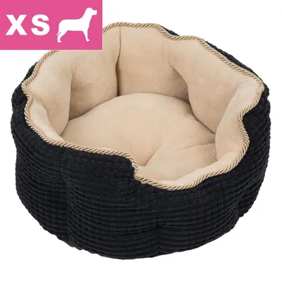 Legowisko dla psa, rozmiar XS widoczny w lewym górnym rogu. Materiał zewnętrzny czarny, wnętrze beżowe, wyraźna faktura tkaniny.