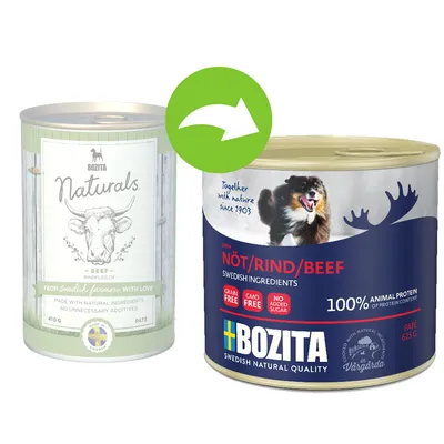 Menjava embalaže: stara konzerva Bozita Naturals Beef 410 g in nova konzerva Bozita Nöt/Rind/Beef 625 g, vidni napisi 'grain free', 'GMO free', 'no added sugar', '100 % animal protein'.