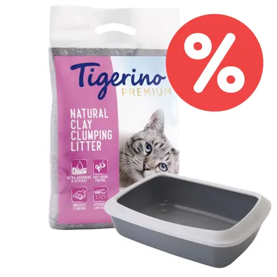 Tigerino Premium Natural Clay Clumping Litter, ultra absorbent, schnelle Geruchskontrolle, sofort klumpend, extrem staubarm. Katzentoilette und Prozentzeichen sichtbar.
