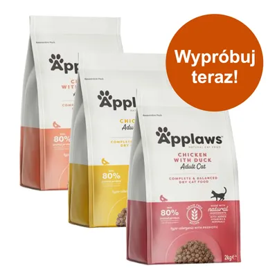 Trzy opakowania karmy Applaws dla kotów: Chicken with Duck Adult Cat, widoczny napis „Wypróbuj teraz!”, informacja o 80% białka zwierzęcego i wadze 2 kg na przednim opakowaniu.