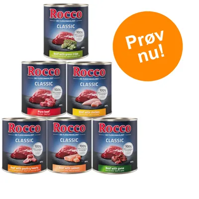 Rocco Classic dåsefoder 800 g: Beef with green tripe, Pure beef, Beef with chicken, Beef with poultry hearts, Beef with salmon, Beef with game. Orange cirkel med teksten Prøv nu!