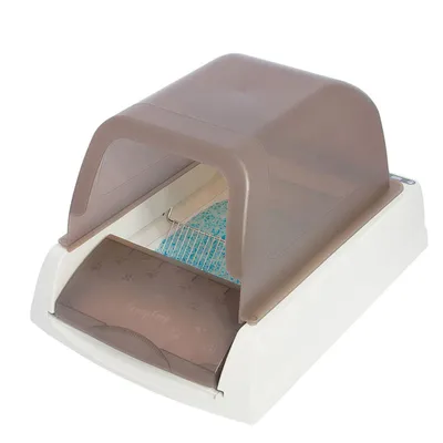 Covered automatic litter box with a transparent brown hood, sliding tray, and blue absorbent crystals visible inside. Covered automatic litter box with a transparent brown hood, sliding tray, and blue absorbent crystals visible inside.