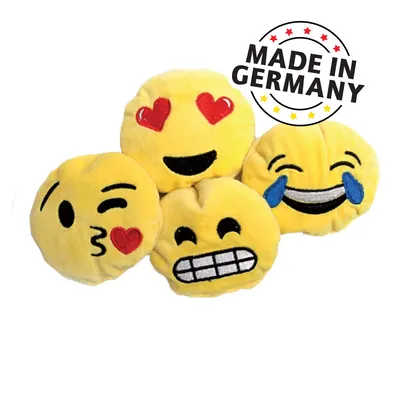 Čtyři žluté emoji hračky s různými výrazy obličeje. Text: Made in Germany.