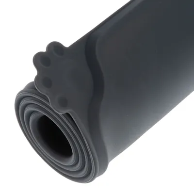 Dark grey rolled-up silicone mat with paw print in the corner. Suitable as a base for food or water bowls.