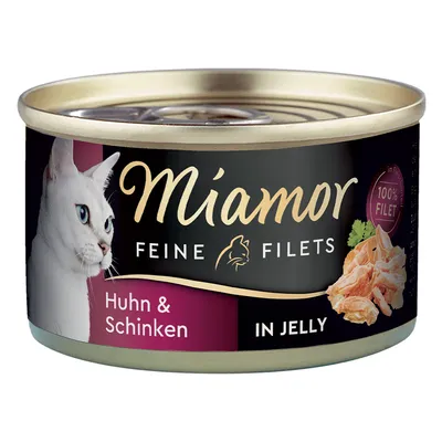 Miamor Feine Filets, Huhn & Schinken in Jelly, 100% Filet. Katzenfutter in Dose mit Abbildung von weisser Katze und Filetstücken.