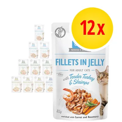 Brit Care Fillets in Jelly dla dorosłych kotów, indyk i krewetki, 12 x 85 g. Widoczny napis: enriched with carrot and rosemary. Opakowania z wizerunkiem kota.