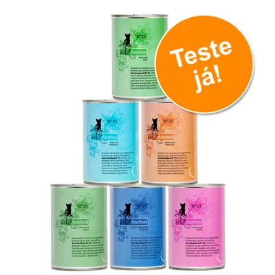 Sete latas de comida húmida para gatos da marca catz finefood, variedades N°15, N°17, N°19, N°21, N°23 e N°25. Círculo laranja com texto: Teste já! Sete latas de comida húmida para gatos da marca catz finefood, variedades N°15, N°17, N°19, N°21, N°23 e N°25. Círculo laranja com texto: Teste já!