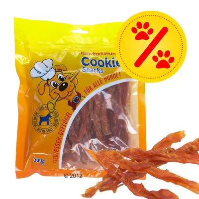 Förpackning med Cookie Snacks Hähnchenfiletstreifen, 200 g. Text: Für alle Hunde!, 100% Natur, Geniesser-Geflügel. Gul rabattmärkning med tassavtryck synlig.