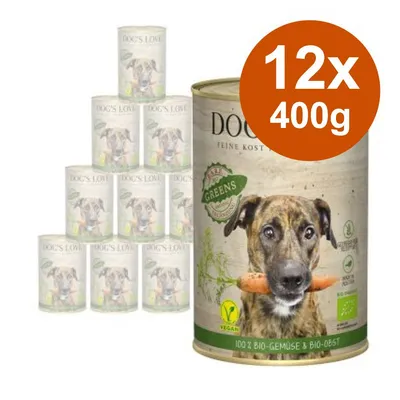 Confezione da 12 lattine DOG'S LOVE Greens, 400 g ciascuna. Etichetta: vegan, 100% bio-verdure e bio-frutta. Immagine di cane con carota in bocca.