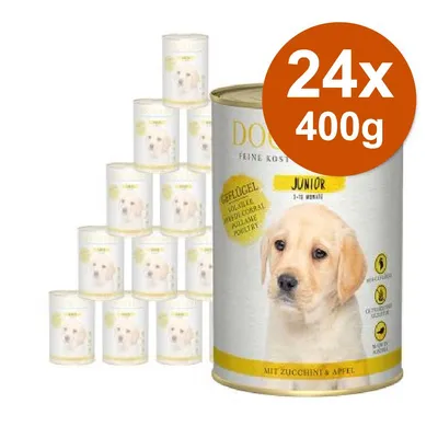 Confezione da 24 lattine da 400 g di cibo umido per cani junior, marchio visibile: DOG, gusto pollame, con zucchine e mela. Etichetta: JUNIOR 1–12 mesi. Confezione da 24 lattine da 400 g di cibo umido per cani junior, marchio visibile: DOG, gusto pollame, con zucchine e mela. Etichetta: JUNIOR 1–12 mesi.
