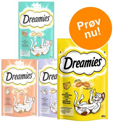 Fire poser Dreamies kattegodbidder, synlige varianter: kalkun, kylling, and og ost. Orange cirkel med teksten 'Prøv nu!'. Hver pose indeholder 60 g.