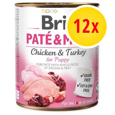 Brit Paté & Meat Chicken & Turkey for Puppy, confezione 12x. Testo visibile: Grain free, Soy & GMO free. Immagine di carne di pollo e tacchino su etichetta.