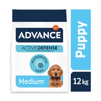 Saco de pienso ADVANCE Active Defense Medium Puppy 12 kg, con texto 'Microbiota sana' y 'con nucleótidos científicamente probados'. Imagen de un perro en la parte inferior. Saco de pienso ADVANCE Active Defense Medium Puppy 12 kg, con texto 'Microbiota sana' y 'con nucleótidos científicamente probados'. Imagen de un perro en la parte inferior.