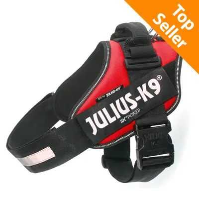 Pettorina per cani Julius-K9 IDC Power, colore rosso e nero, scritta visibile 'JULIUS-K9 IDC POWER', etichetta arancione in alto a destra con testo 'Top Seller'.