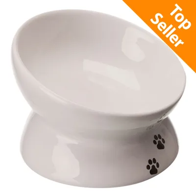 Ciotola rialzata in ceramica bianca con impronte nere, angolo arancione in alto a destra con testo Top Seller. Ciotola rialzata in ceramica bianca con impronte nere, angolo arancione in alto a destra con testo Top Seller.