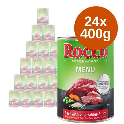 Rocco Menu Beef with vegetables & rice, 24 puszki po 400 g. Na etykiecie widoczne mięso, warzywa i ryż. Tekst: Enriched with carbohydrates. Opakowania ustawione w piramidę.